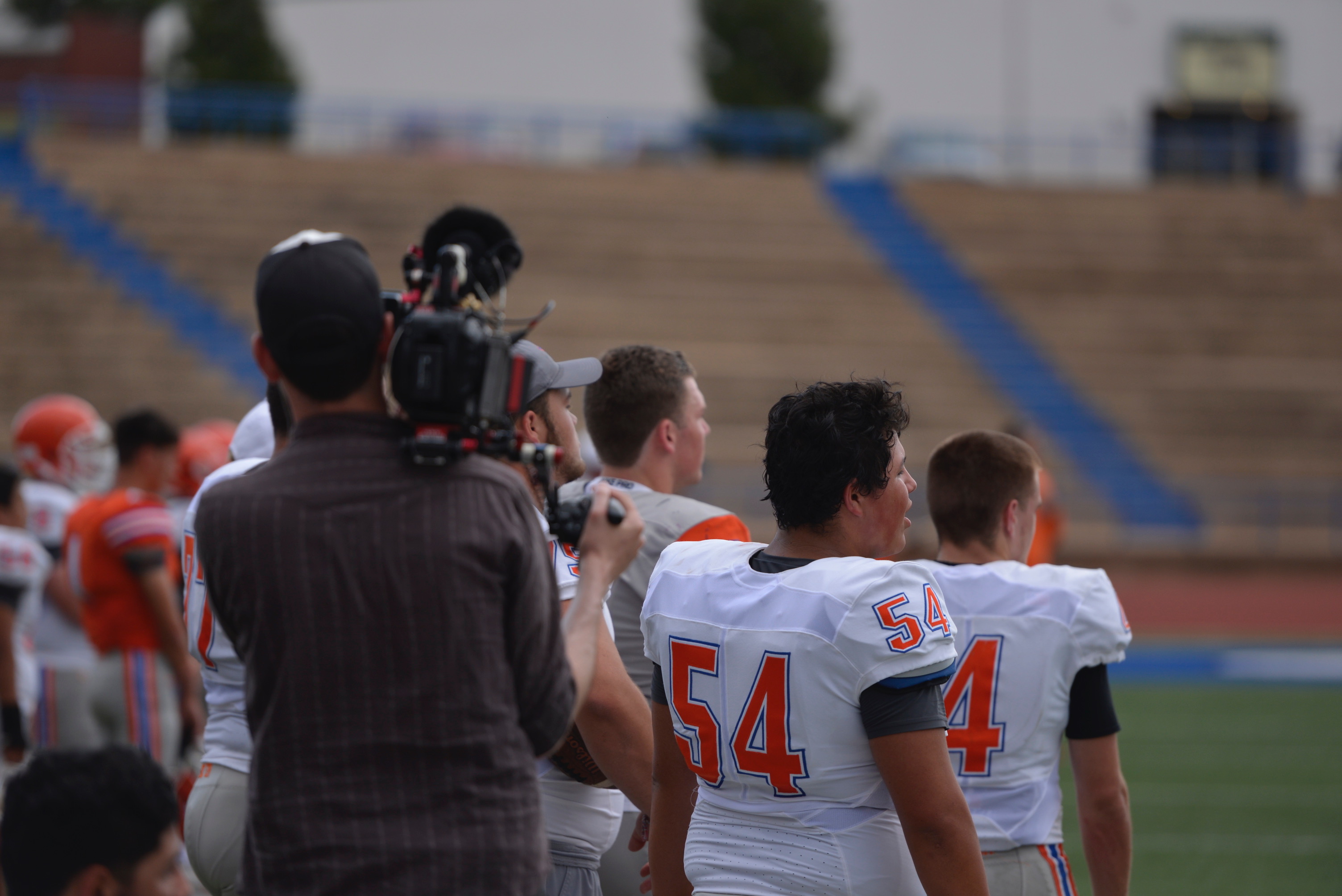 Beyond the Lights" films Central players while they watch the spring game. May 18, 2018 (LIVE! Photo/Sam Fowler)