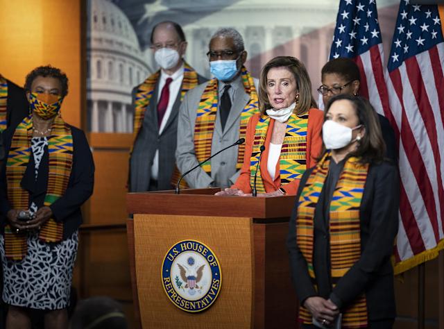 Ethnic Democrats in traditional attire.