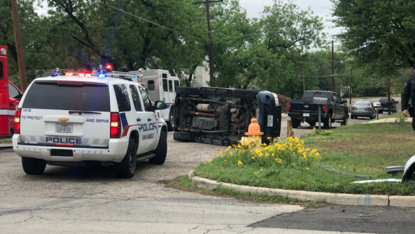 WATCH: Drivers Escape Injury in Neighborhood Rollover Crash