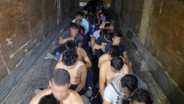 Border Agents Catch Illegals Crammed into a Stock Trailer Following Crash