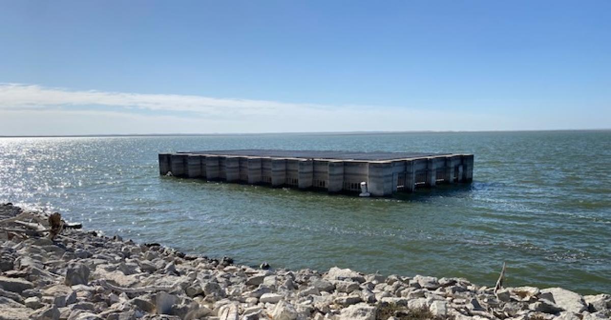 WATCH A Cage and a Spillway Connect Two Popular Lakes