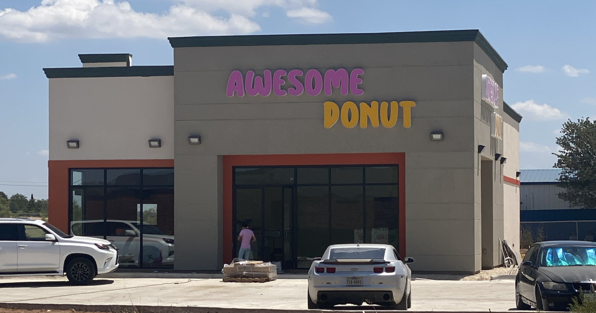 Signs Up at Awesome Donut Shop