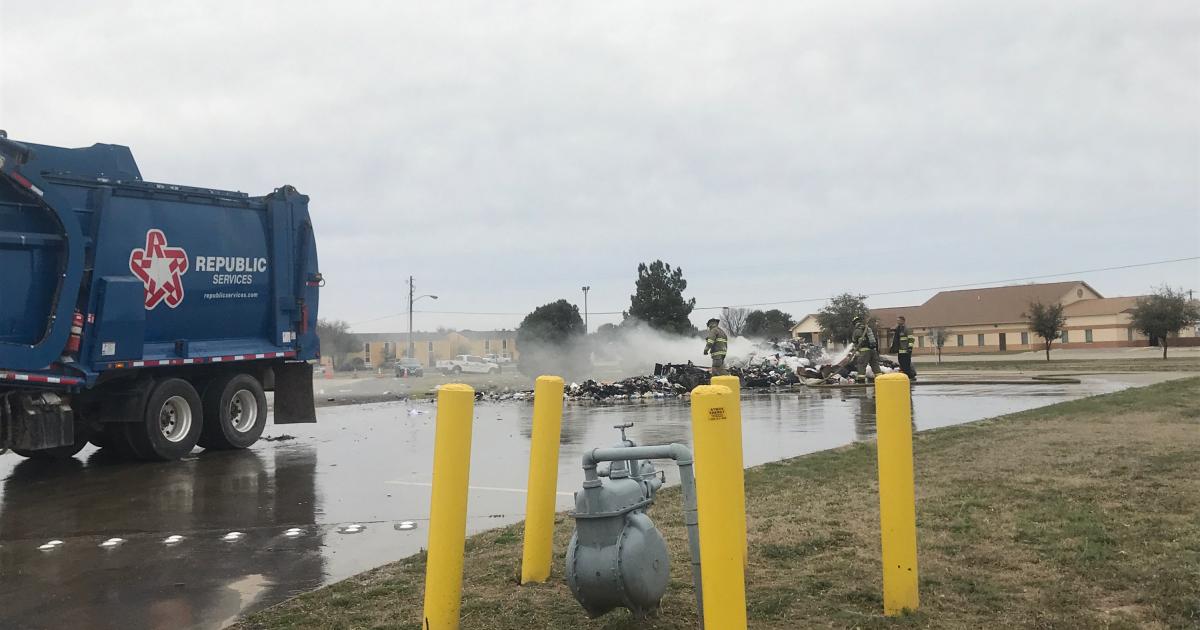 Republic Trash Truck Dumps Fiery Load at DPS Office