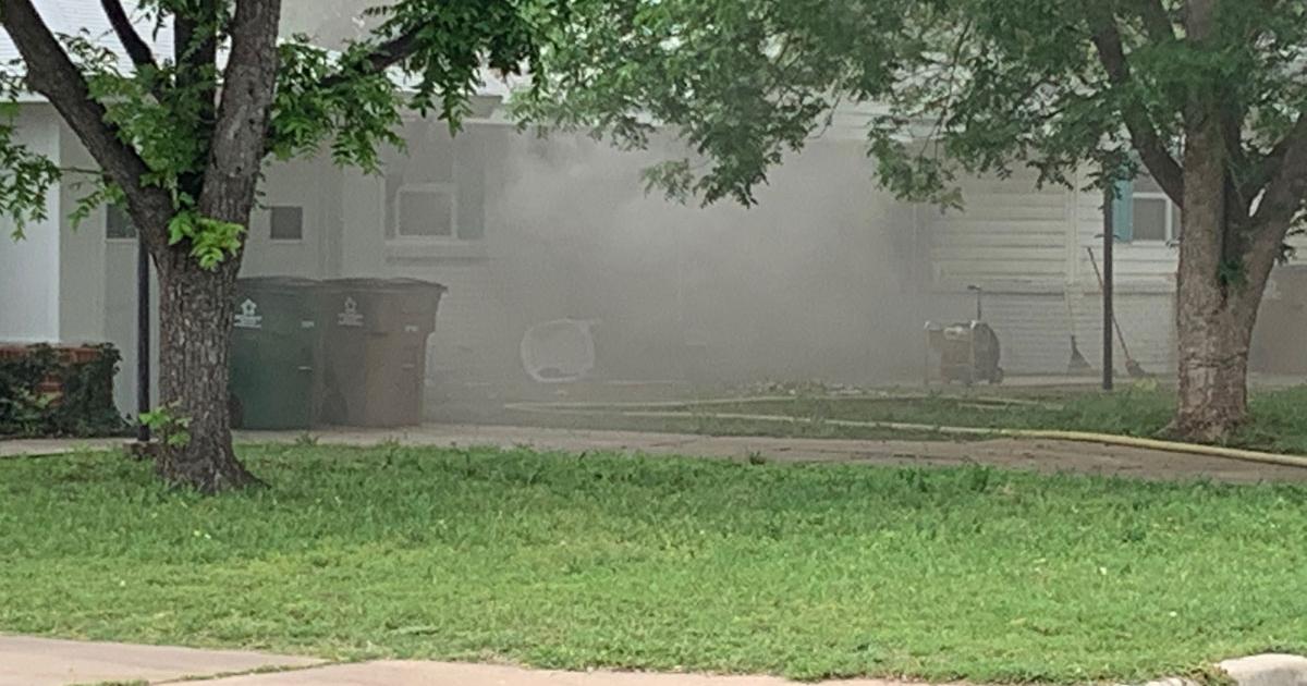 Firefighters Bust Down Door of Home as Smoke Pours Out