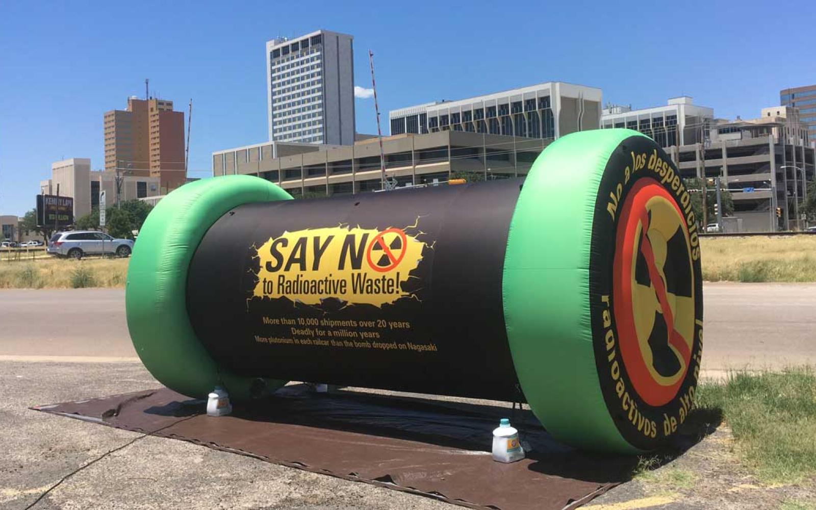 In 2019, protesters in Midland inflate a mock spent nuclear fuel cask to show the size of the containers that may be brought by train or to Waste Control Specialists’ facility in Andrews County.