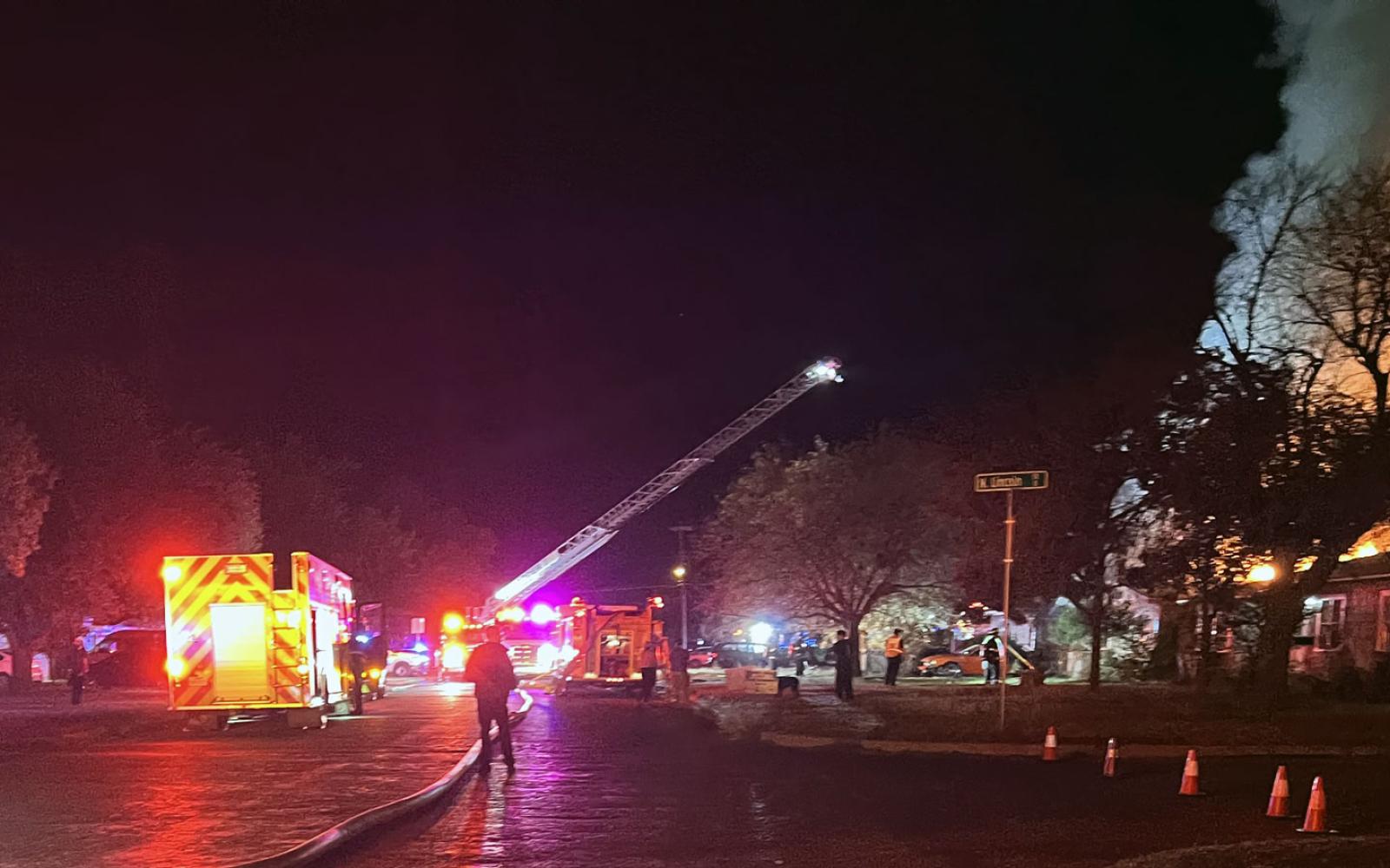 San Angelo Fire Department Ladder 7 shoots water on active structure fire in the 2400 block of W Harris Ave on Nov. 28, 2021.
