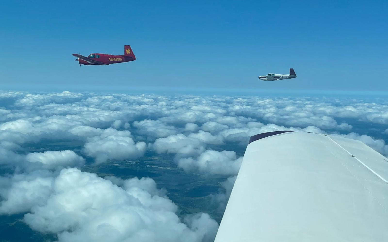 Three Mooney M20Cs practice formation flying near San Marcos in 2021