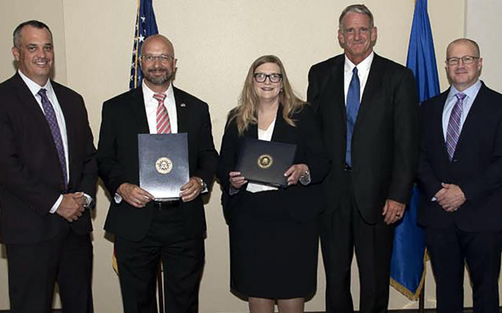 FBI Director’s Certificate recipients John “Nick” Hanna, Jeffrey Haag and Sean Long pictured with FBI Special Agent in Charge Matthew DeSarno, FBI Forensic Accountant Amy Hansen and FBI Assistant Special Agent in Charge Geoffrey McGuire. 