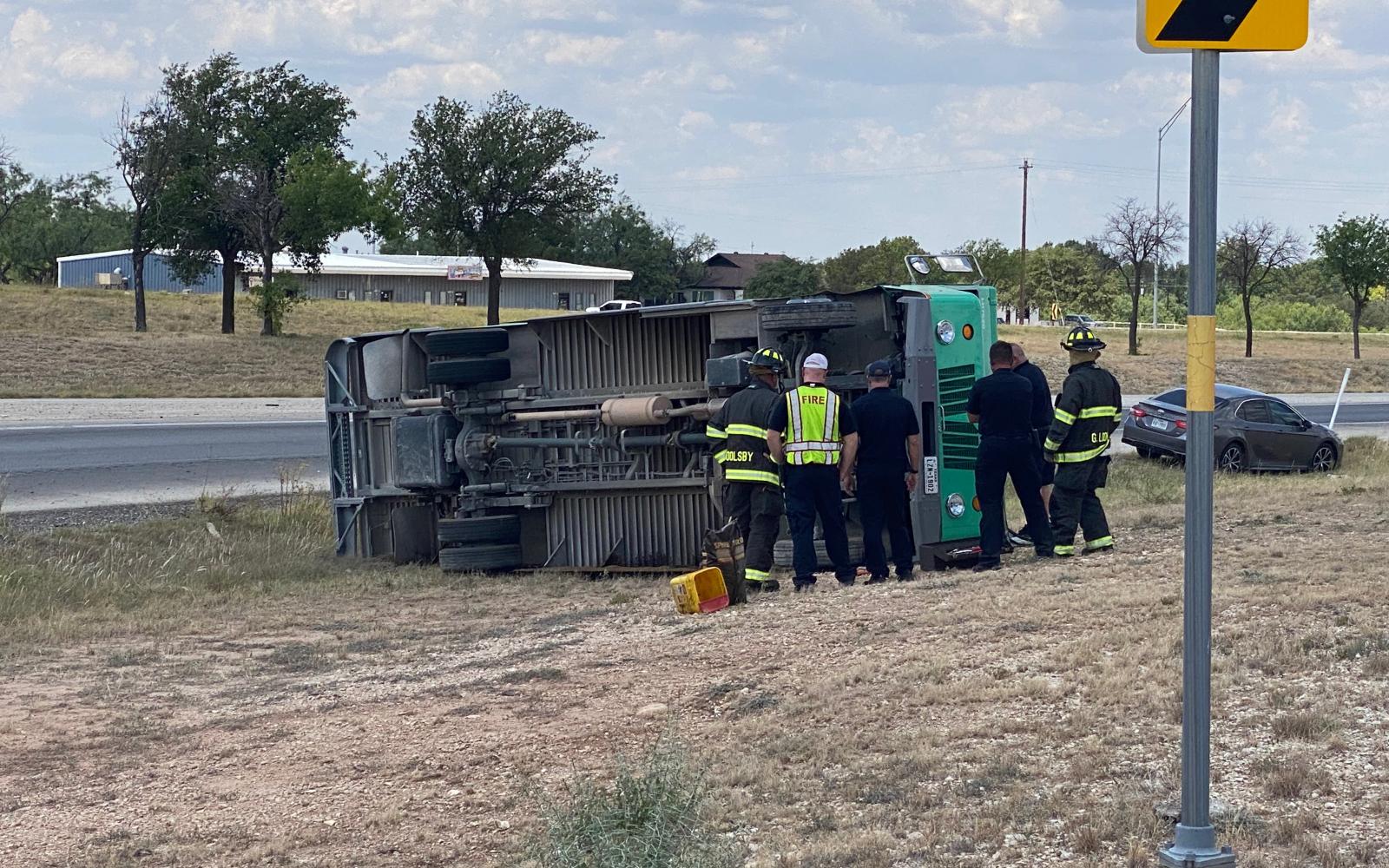 A Unifirst delivery truck capsized on the access road to Loop 306 near the Ben Ficklin Bridge on June 30, 2022