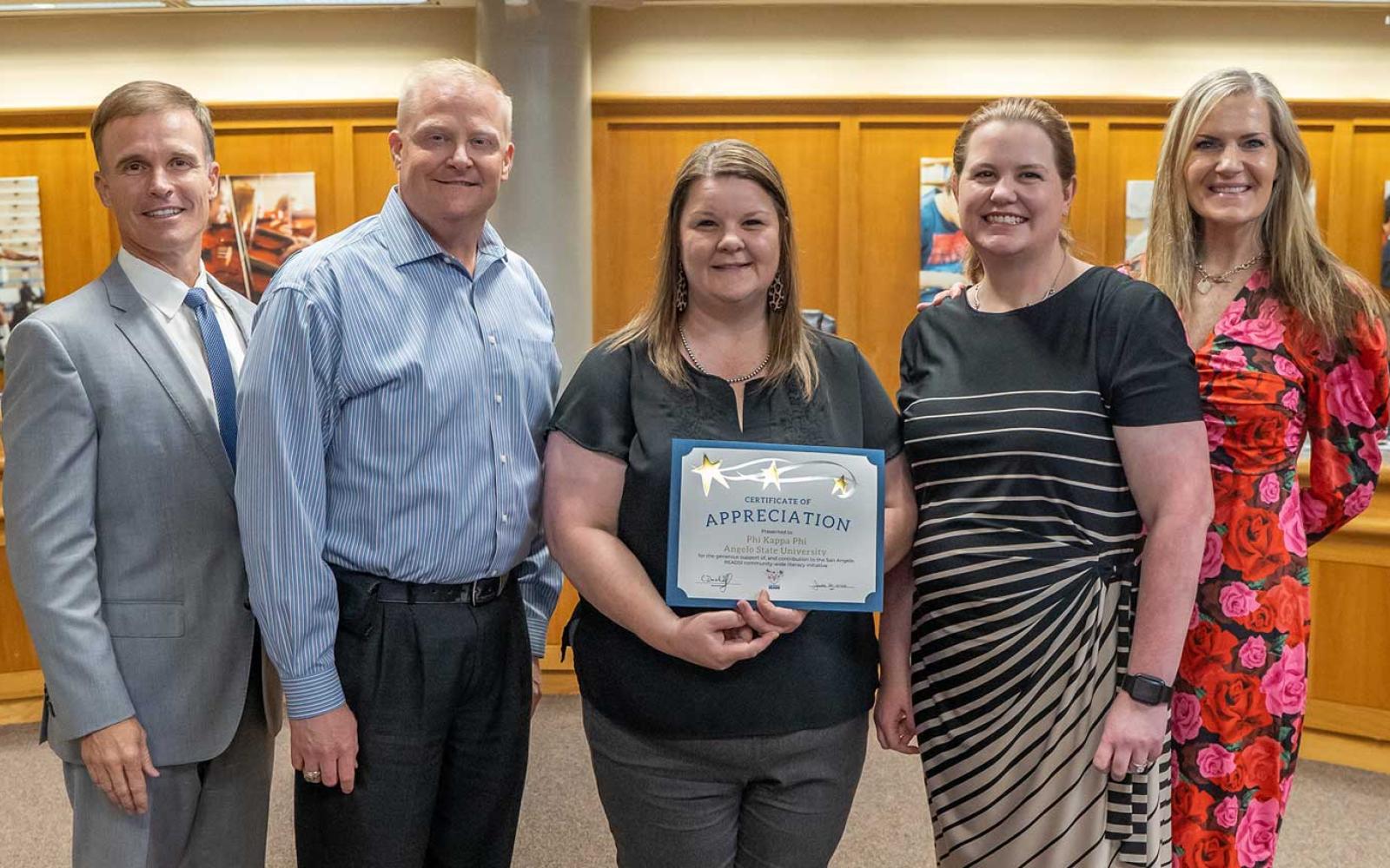 (L-R) Dr. Carl Dethloff, SAISD superintendent; Dr. Bradley Petty, ASU PKP treasurer; Dr. Dara Anderson, ASU PKP public relations officer; Dr. Lesley Casarez, ASU PKP past-president; Dr. Tia Agan, ASU PKP president