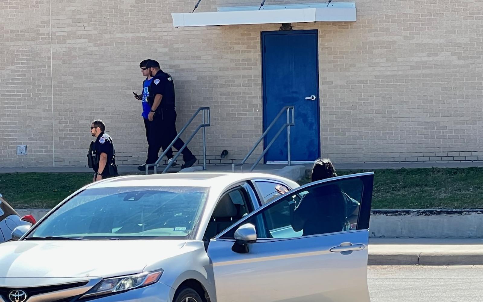 Police surround Central High School on September 30, 2022