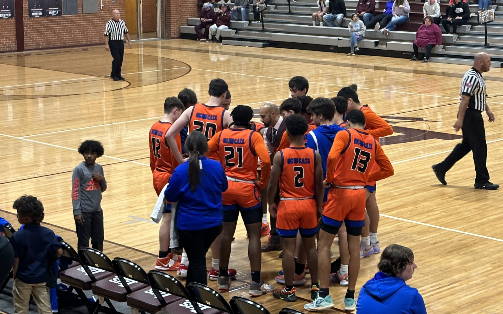 Bobcats during a timeout vs Legacy