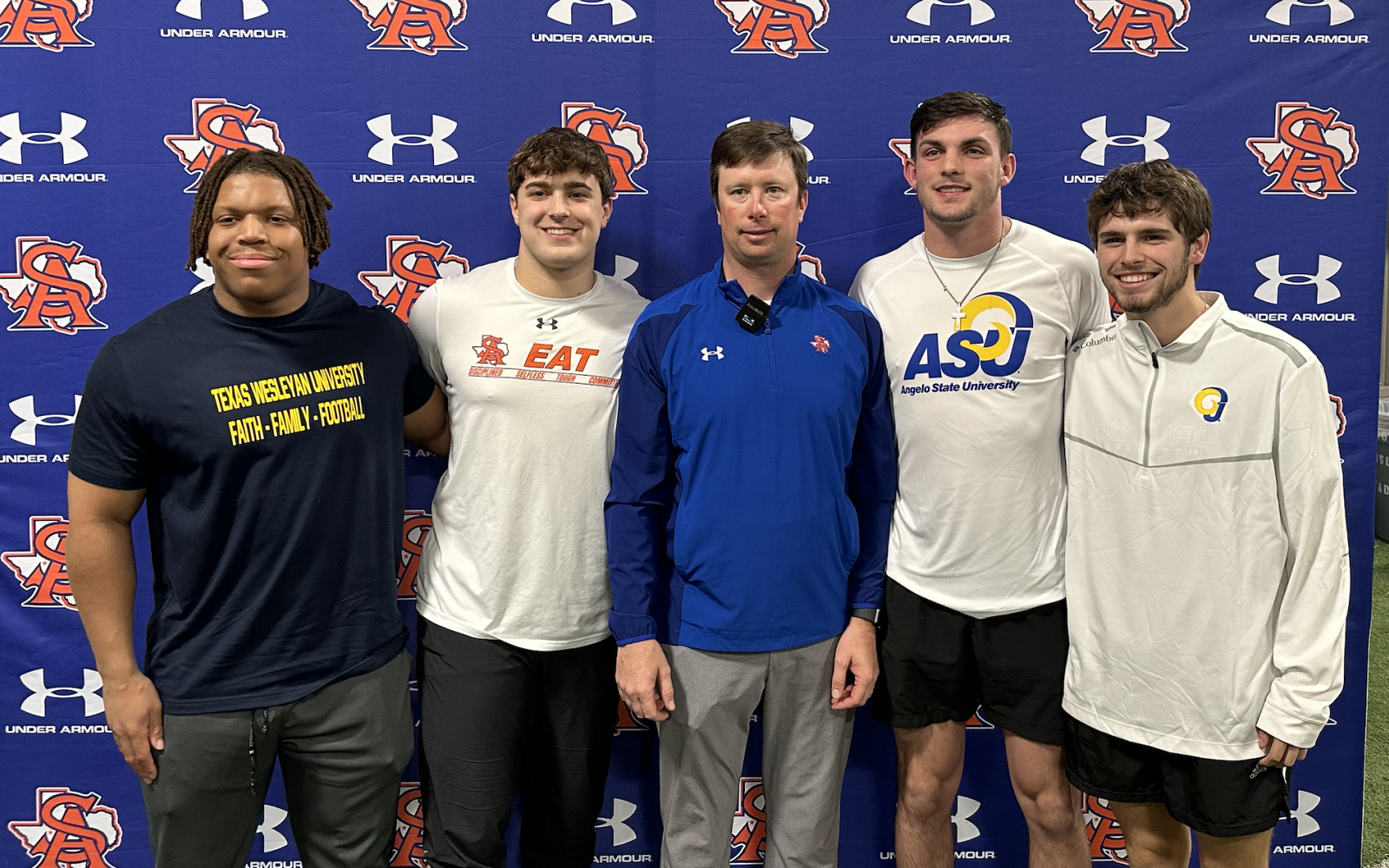 Central Bobcats' Football Players with Head Coach Kevin Crane