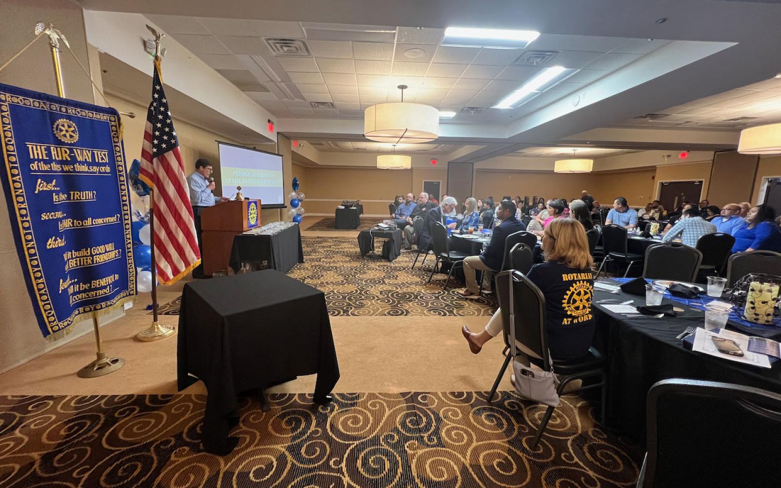 Rotarian Edward Yale opens the presentation of Lake View High School's Top 25 Graduates