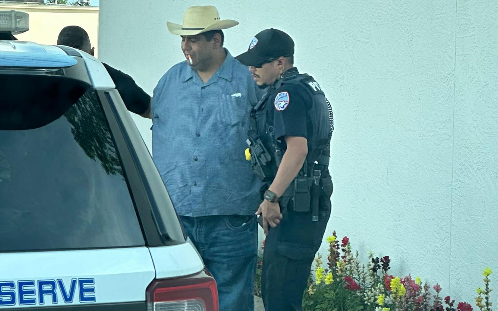 When the suspect Gerarrdo Lopez was arrested, he was still wearing the farmer's hat!