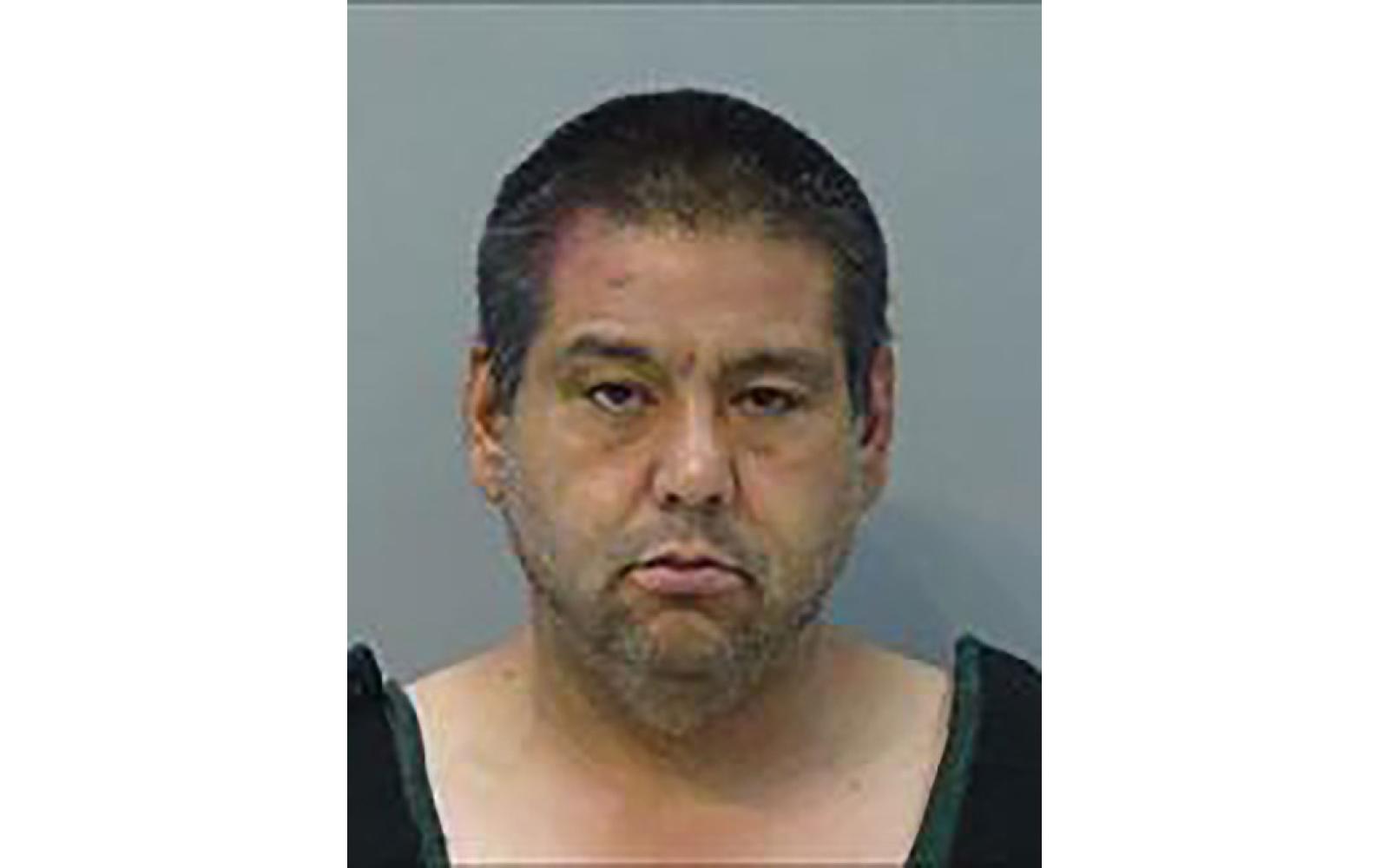 Jail house photo of Gerarrdo Lopez, who is accused of attempting to cash a farmer's check.