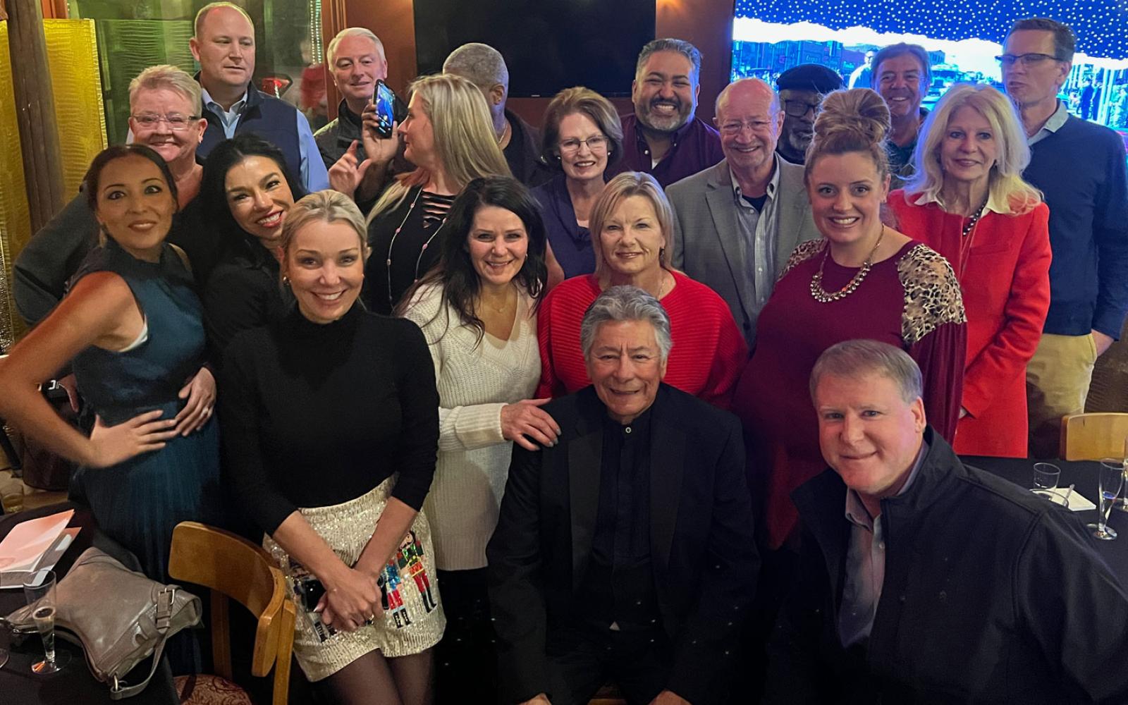 Del Velasquez, bottom row, second from left, surrounded by the Downtown San Angelo, Inc. board of directors at his surprise retirement party on Dec. 5, 2023.