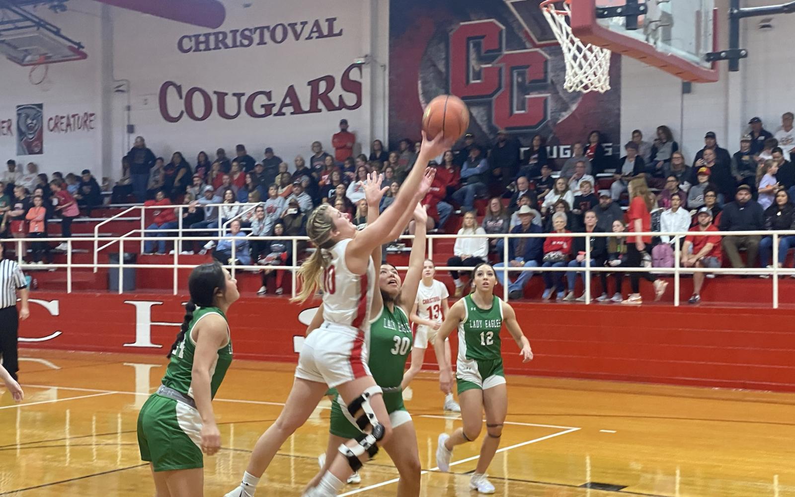 Christoval Lady Cougar Halley Hughes Goes up for a shot against the Eldorado Lady Eagles