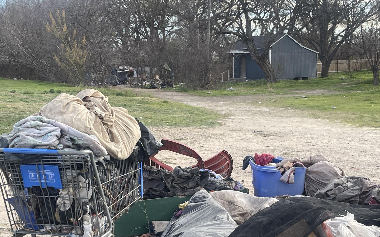 Trash Pile in Front of Camp Entrance