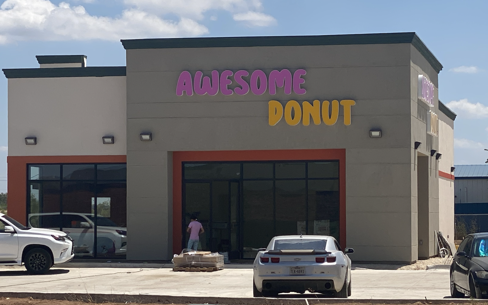 Business- Awesome Donut Shop puts up signs