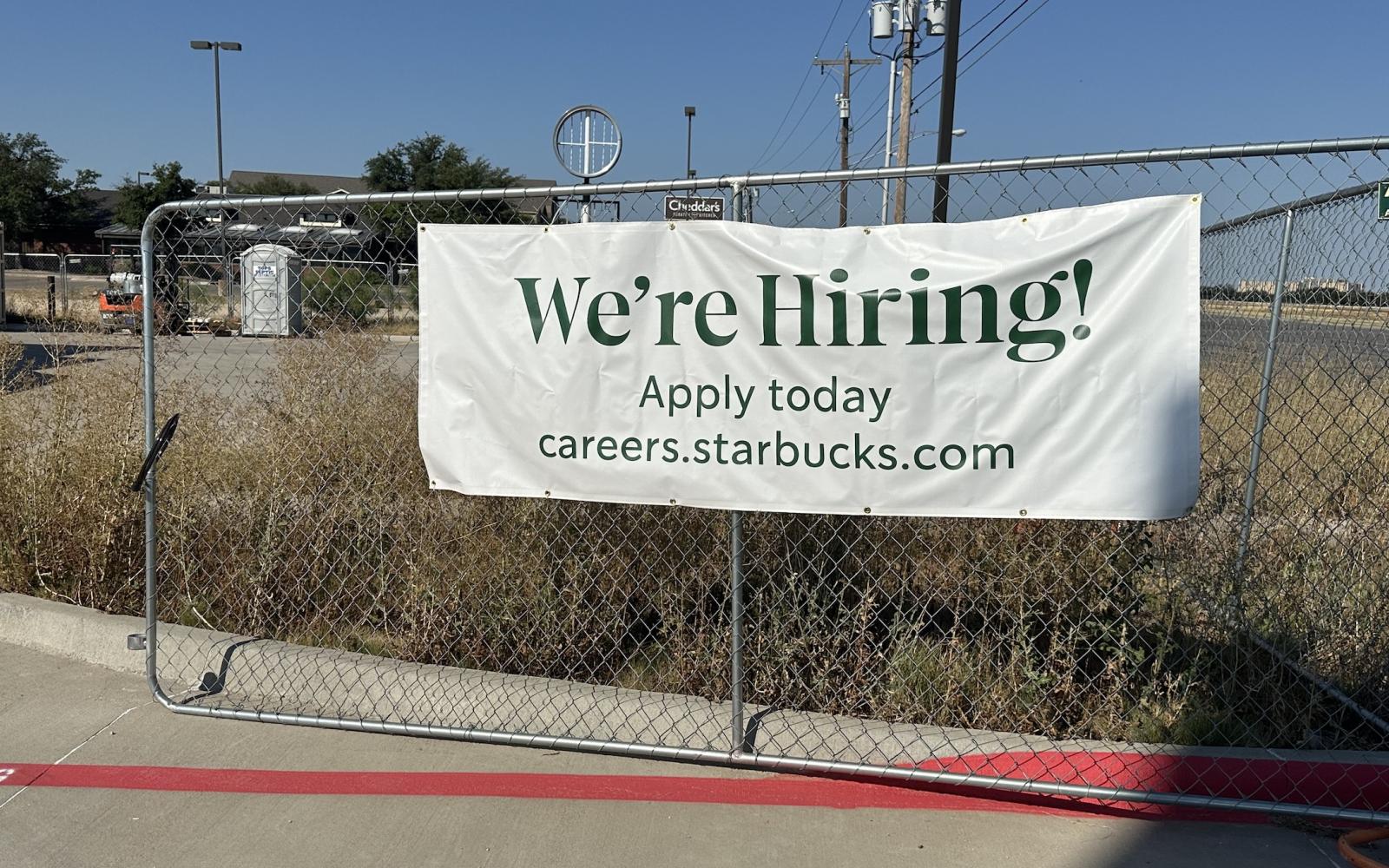 Now Hiring sign at San Angelo's newest Starbucks location