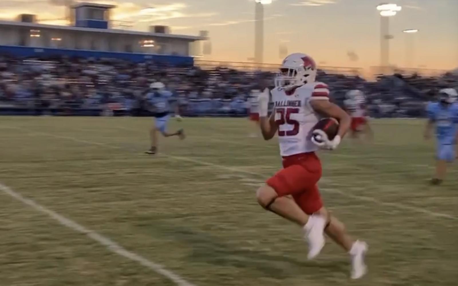 Ballinger's Hunter Kresta races down the sideline for a 64-yard touchdown catch in the Bearcats' 61-6 win over San Angelo TLCA on Friday, Sept. 13, 2024, at Lake View Stadium.