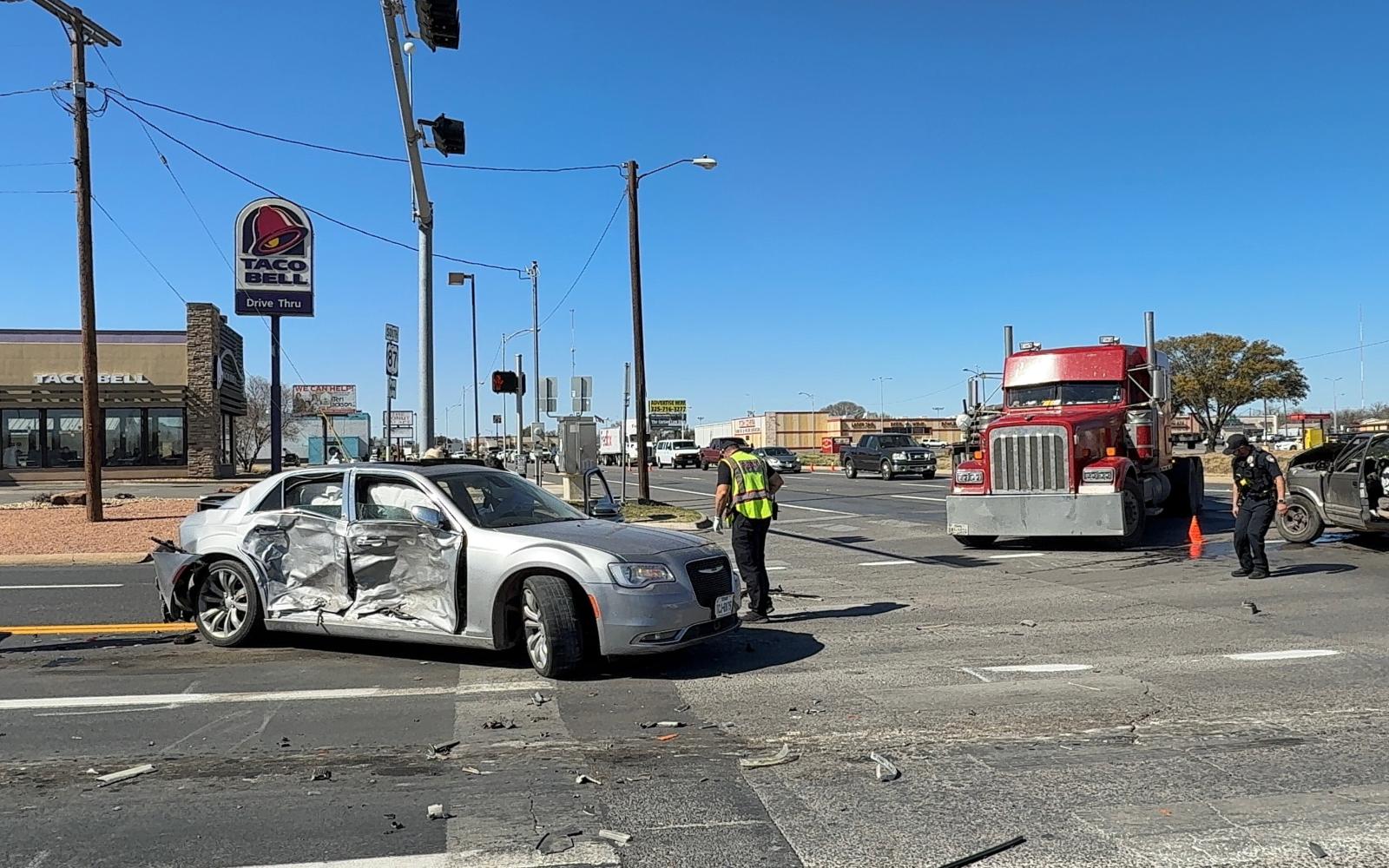 A three-vehicle crash shut down a major San Angelo intersection Monday and sent three people to the hospital.