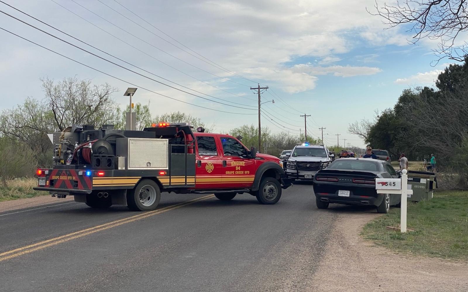 Sheriff Escorts Ambulance from Scene of Rollover Crash