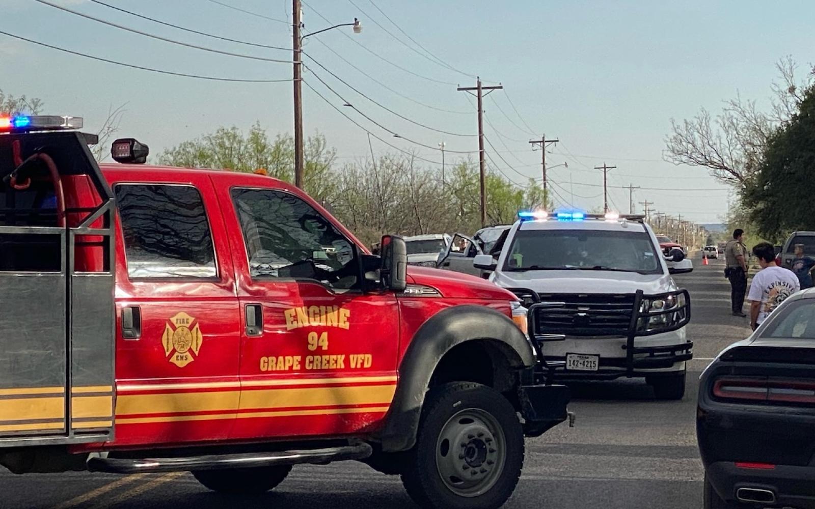 Sheriff Escorts Ambulance from Scene of Rollover Crash