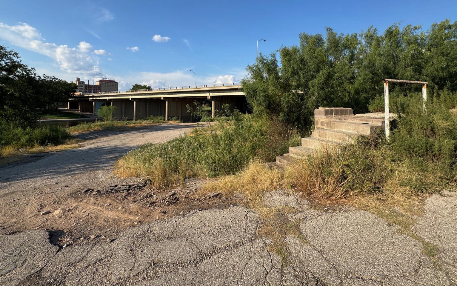 Ruins from the Beaver Lodge Motel, such as this staircase and dilapidated parking lot pavement, are still on the property.