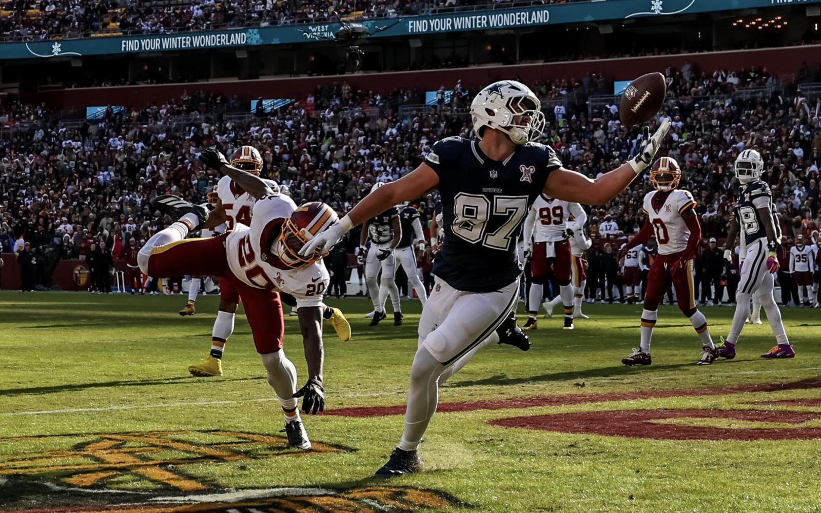 Dallas Cowboys' Jake Ferguson catches a touchdown pass against the Washington Commanders