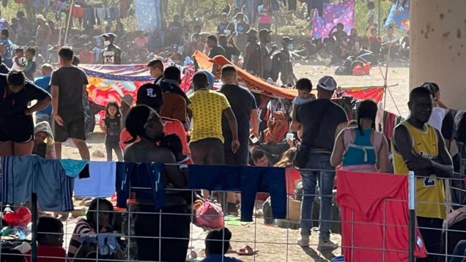 Migrants gathered and camping underneath the Del Rio International Bridge Migrants gathered and camping underneath the Del Rio International Bridge