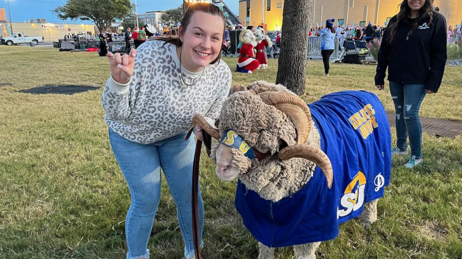 Angelo State University's official mascot, Dominic the ram, with his handler, Animal Science major Brenna Bell. Angelo State University's official mascot, Dominic the ram, with his handler, Animal Science major Brenna Bell.