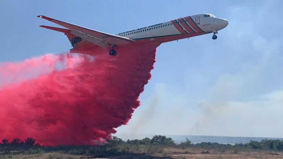 Air Tanker Drops Load on Texas Wildfire (Contributed/TAMUFS) Air Tanker Drops Load on Texas Wildfire (Contributed/TAMUFS)