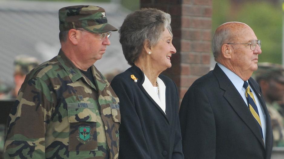 From left to right, Col. Richard Ayres, 17th Training Wing Commander; JoAnne Powell and retired Col. Charlie Powell stand at attention during the playing of the Armed Forces Medley Sept. 11, 2008. Colonel and JoAnne Powell were recognized for their continuing service and dedication to the people of Goodfellow Air Force Base. (U.S. Air Force photo by Tech. Sgt. Gina O’Bryan) From left to right, Col. Richard Ayres, 17th Training Wing Commander; JoAnne Powell and retired Col. Charlie Powell stand at attention during the playing of the Armed Forces Medley Sept. 11, 2008. Colonel and JoAnne Powell were recognized for their continuing service and dedication to the people of Goodfellow Air Force Base. (U.S. Air Force photo by Tech. Sgt. Gina O’Bryan)
