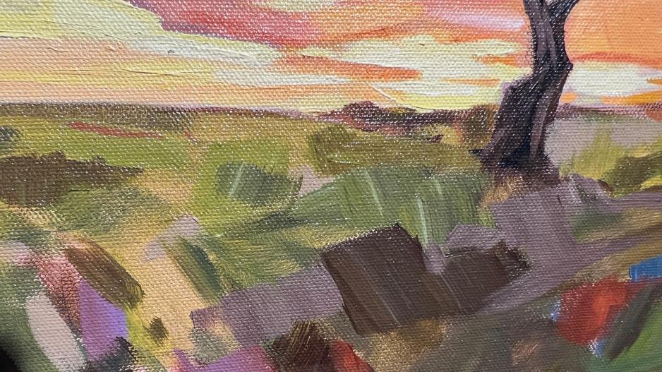 A closeup of Carla Bosch's "Rattlesnake Mountain" painting during the 2022 En Plein Air Texas competition in San Angelo, Texas A closeup of Carla Bosch's "Rattlesnake Mountain" painting during the 2022 En Plein Air Texas competition in San Angelo, Texas