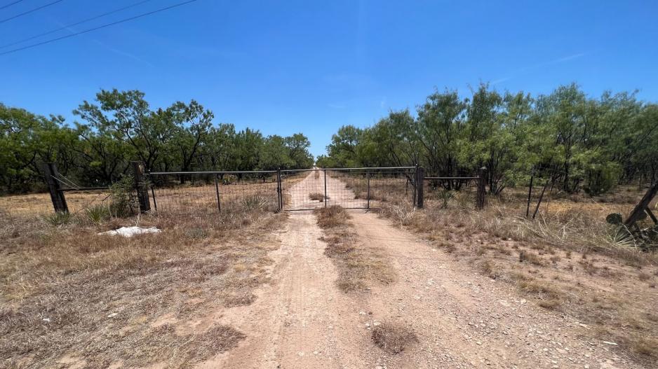 A gate facing US 67 that could lead to the location of the proposed new landfill. A gate facing US 67 that could lead to the location of the proposed new landfill.