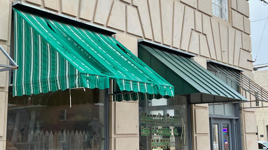 The old awning and a representation of the new steel awnings to be installed soon. The old awning and a representation of the new steel awnings to be installed soon.