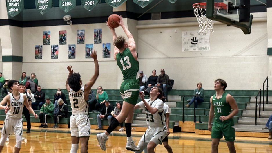 Wall's Everson Armstrong rebounds the Basketball. Wall's Everson Armstrong rebounds the Basketball.