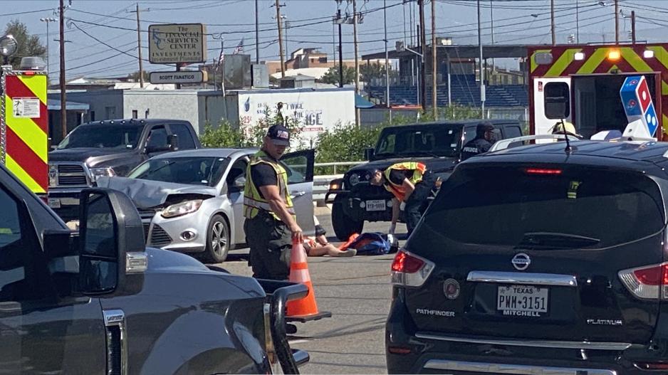 Injured Person on the Ground after Knickerbocker Rd. Crash 3.23 (LIVE! Photo/James Bouligny) Injured Person on the Ground after Knickerbocker Rd. Crash 3.23 (LIVE! Photo/James Bouligny)
