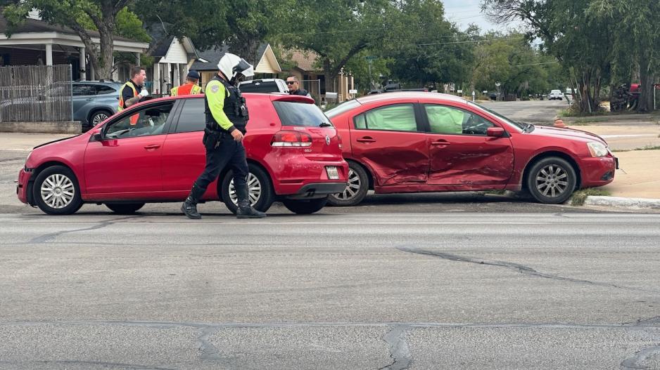 A red Mitsubishi sedan was T-boned by the red Volkswagen hatchback on Sept 12, 2023. A red Mitsubishi sedan was T-boned by the red Volkswagen hatchback on Sept 12, 2023.