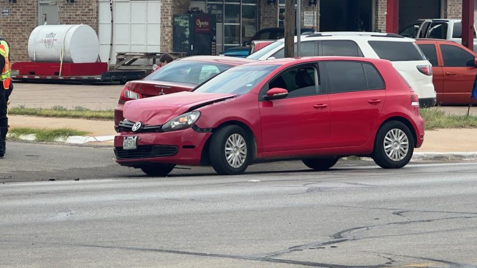 A red Mitsubishi sedan was T-boned by the red Volkswagen hatchback on Sept 12, 2023. A red Mitsubishi sedan was T-boned by the red Volkswagen hatchback on Sept 12, 2023.
