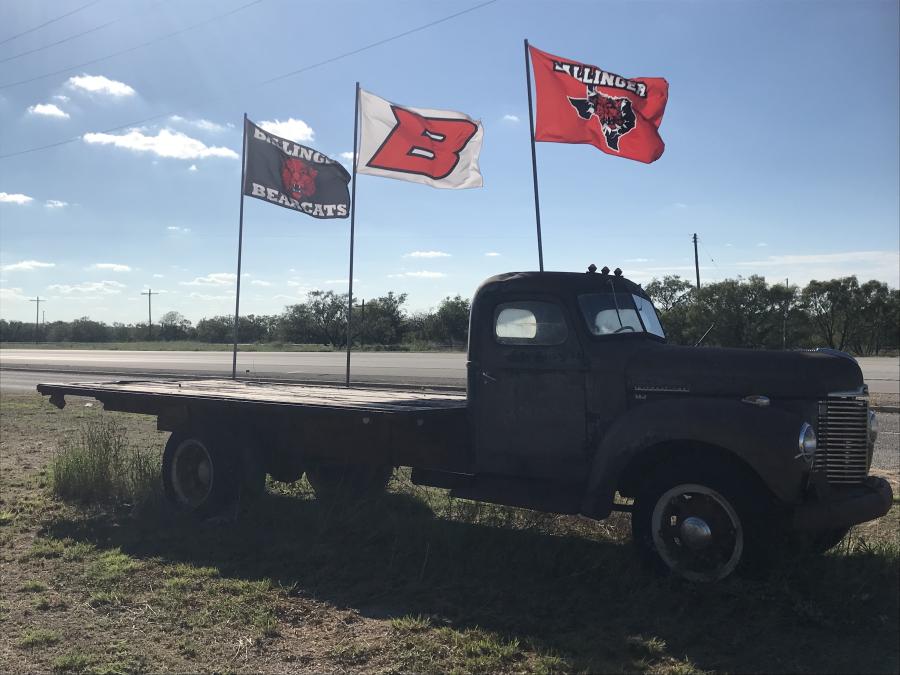 Three Ballinger Bearcats flags are flown on an old truck along the side of the road on US Highway 67 in Rowena on Wednesday, Sept. 18, 2024.