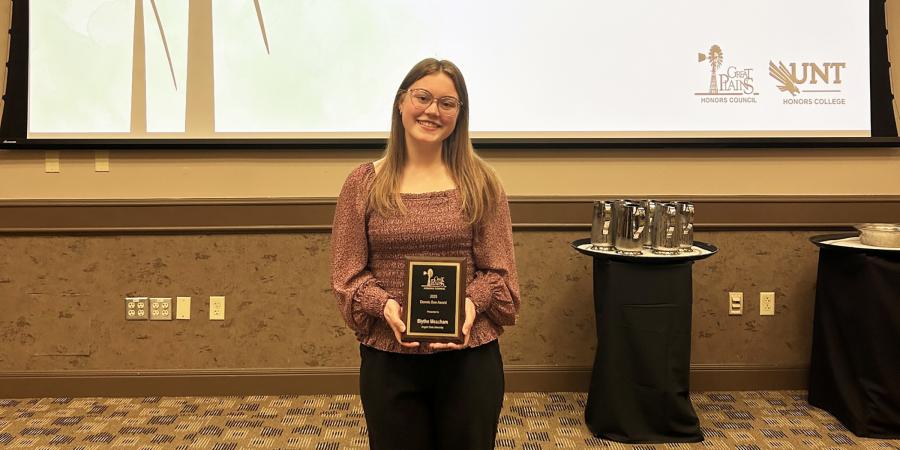 ASU honors student Blythe Meacham with her Dennis Boe Award ASU honors student Blythe Meacham with her Dennis Boe Award