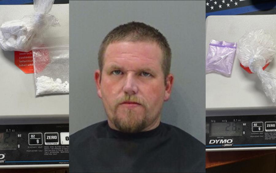 Man Slumped Behind Wheel Found With Drugs, Guns in Sterling County