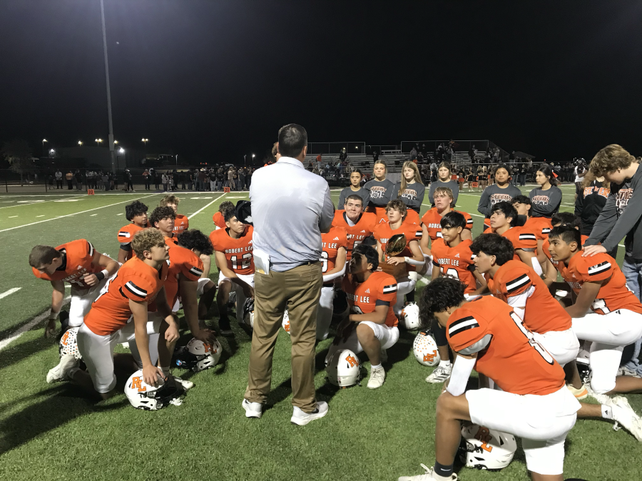 Robert Lee head coach Lee McCown talks to his team following their 60-14 win over Ira in the opening round of the playoffs Friday, Nov. 14, 2025.