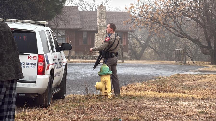Law enforcement has surrounded a house in a San Angelo neighborhood after a car chase Friday morning.