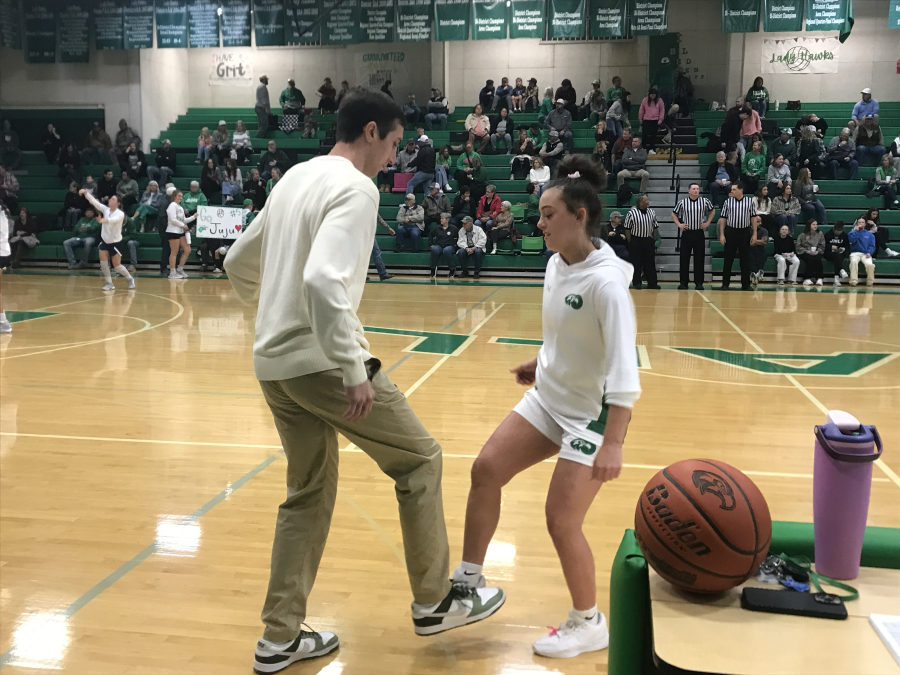 Wall girls basketball coach Silas Crisler and Kylee Holik perform a pregame routine before playing Jim Ned on Tuesday, Jan. 20, 2026.