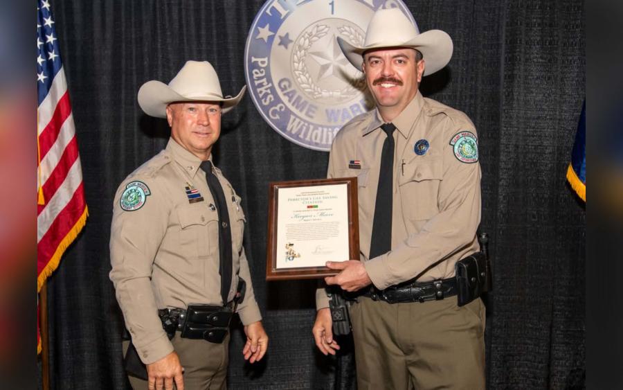 Runnels County Game Warden Keegan Moore honored with Director's Life Saving Citation for applying a tourniquet that saved a crash victim's life.