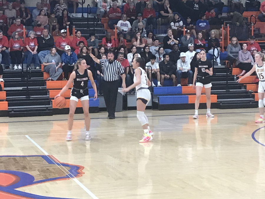 Ballinger's Ashtyn Wilson is guarded by Ozona's Kaidence Tambunga during their playoff game Monday, Feb. 16, 2026.